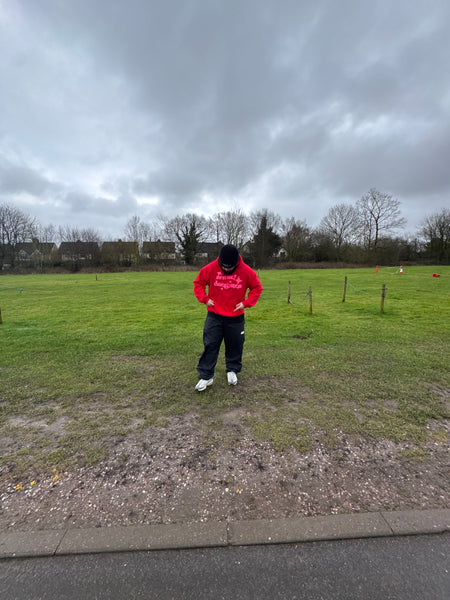 ARMED & DANGEROUS (RED PULLOVER HOOD)