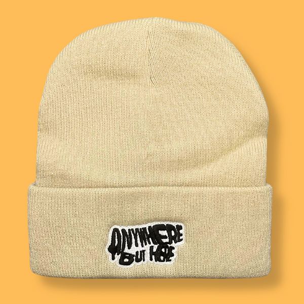 ANYWHERE BUT HERE BEANIE (BEIGE)